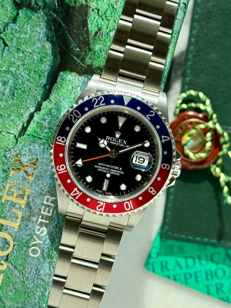 Featured image for Rolex GMT-Master II "Pepsi" 16710 T Black 2005 with original box and papers