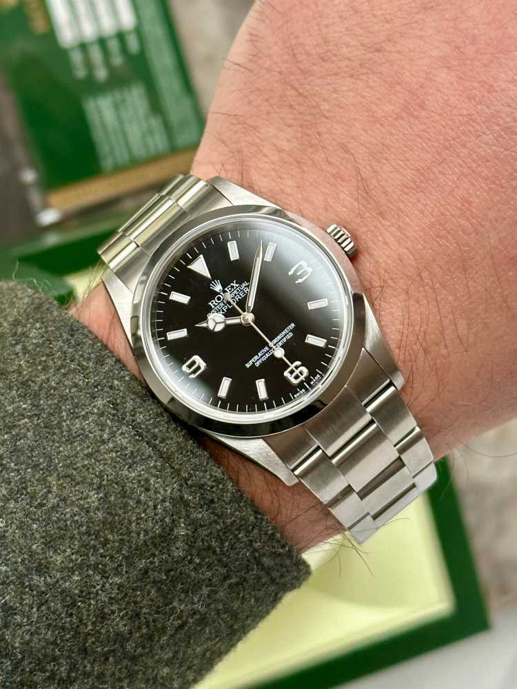 Wrist shot image for Rolex Explorer 1 "Engraved Rehaut" 114270 Black 2008 with original box and papers 2