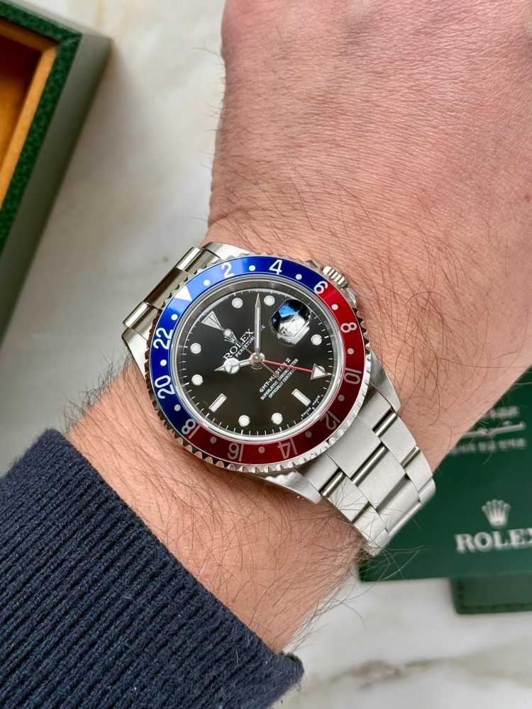 Wrist shot image for Rolex GMT-Master II "Pepsi" 16710 Black 2000 with original box and papers 2