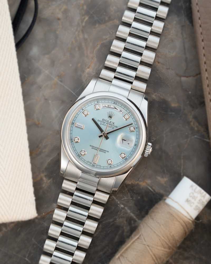 Featured image for Rolex Day-Date Platinum Arabic 118206 Blue 2009 with original box and papers