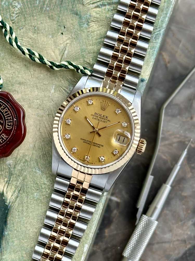 Featured image for Rolex Midsize Datejust "Diamond" 68273 Gold 1988 with original box and papers
