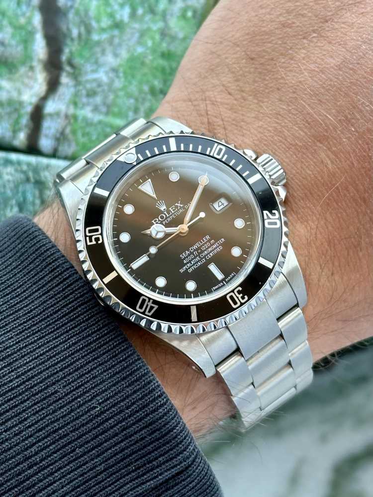 Wrist shot image for Rolex Sea-Dweller 16600 Black 1999 with original box and papers
