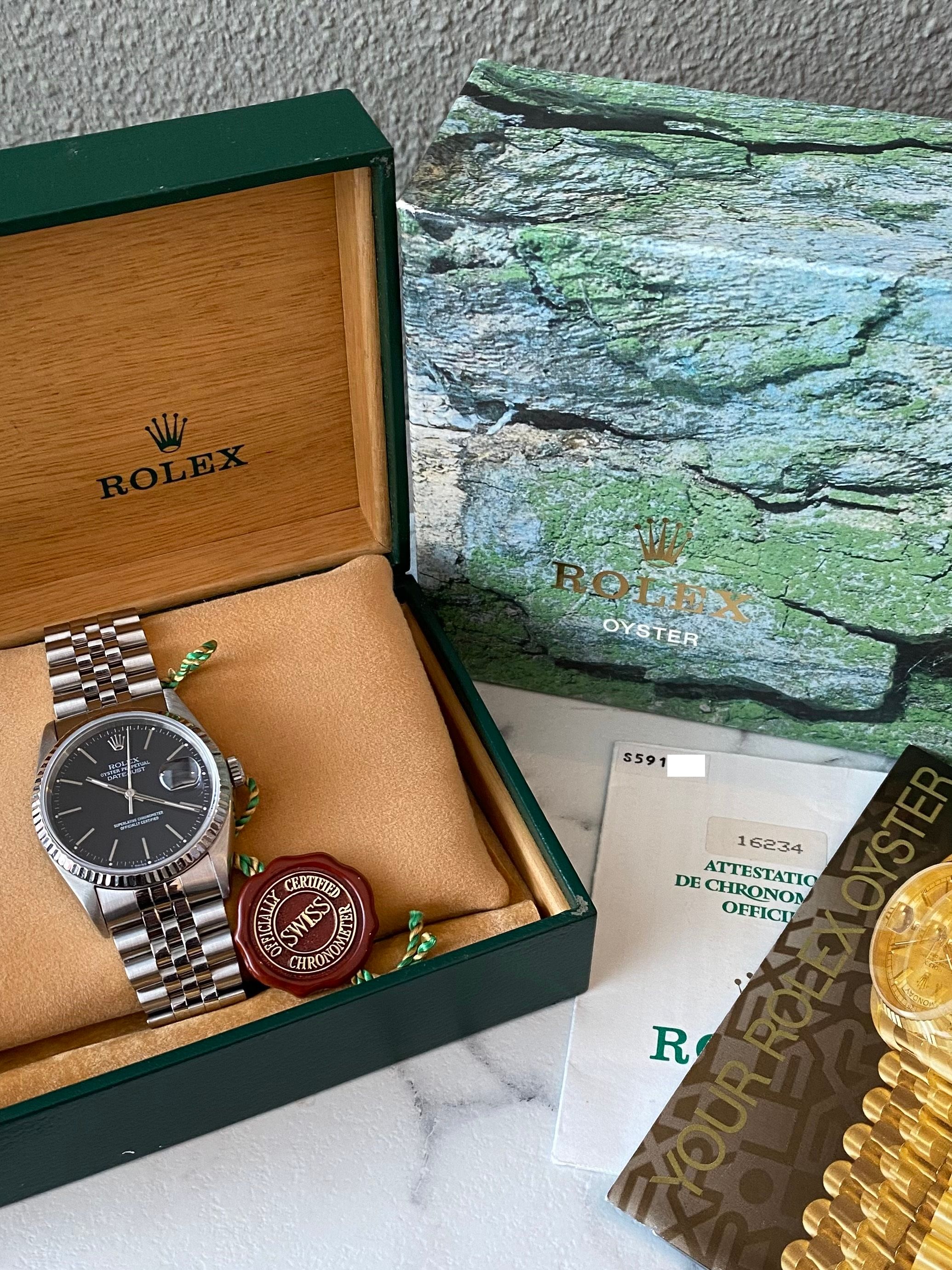 Rolex Datejust 16234 Black 1993 with original box and papers