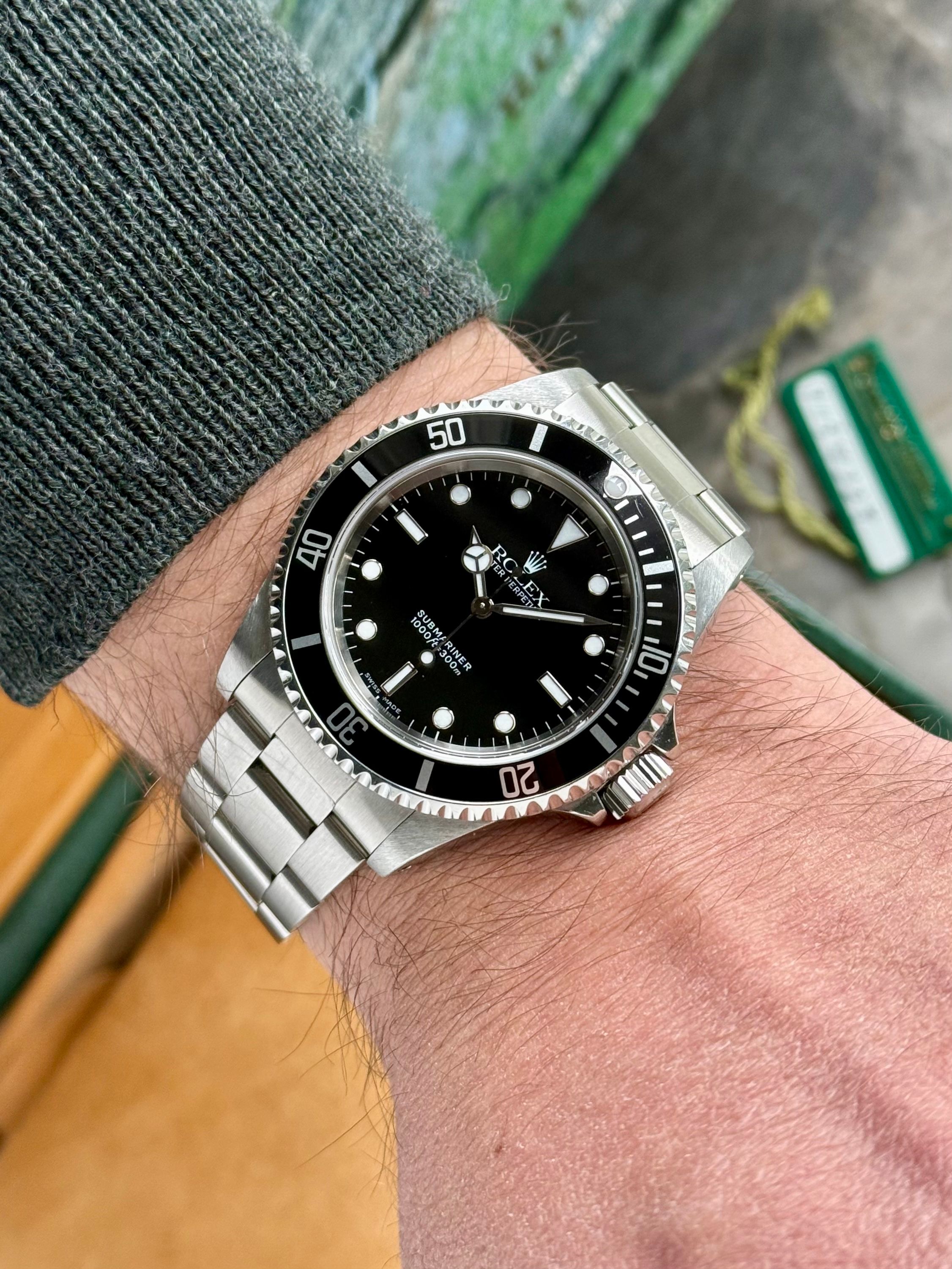 Rolex Submariner 14060 Black 2000 with original box and papers 2