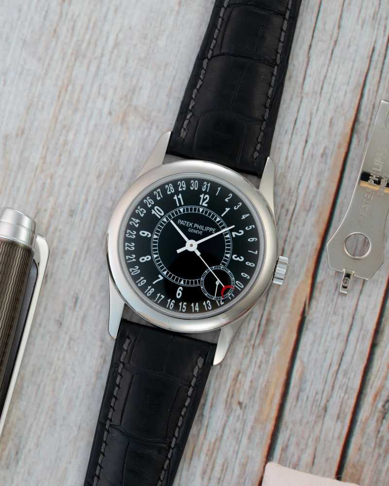 Featured image for Patek Philippe Calatrava 6000G Black 2010 with original box and papers