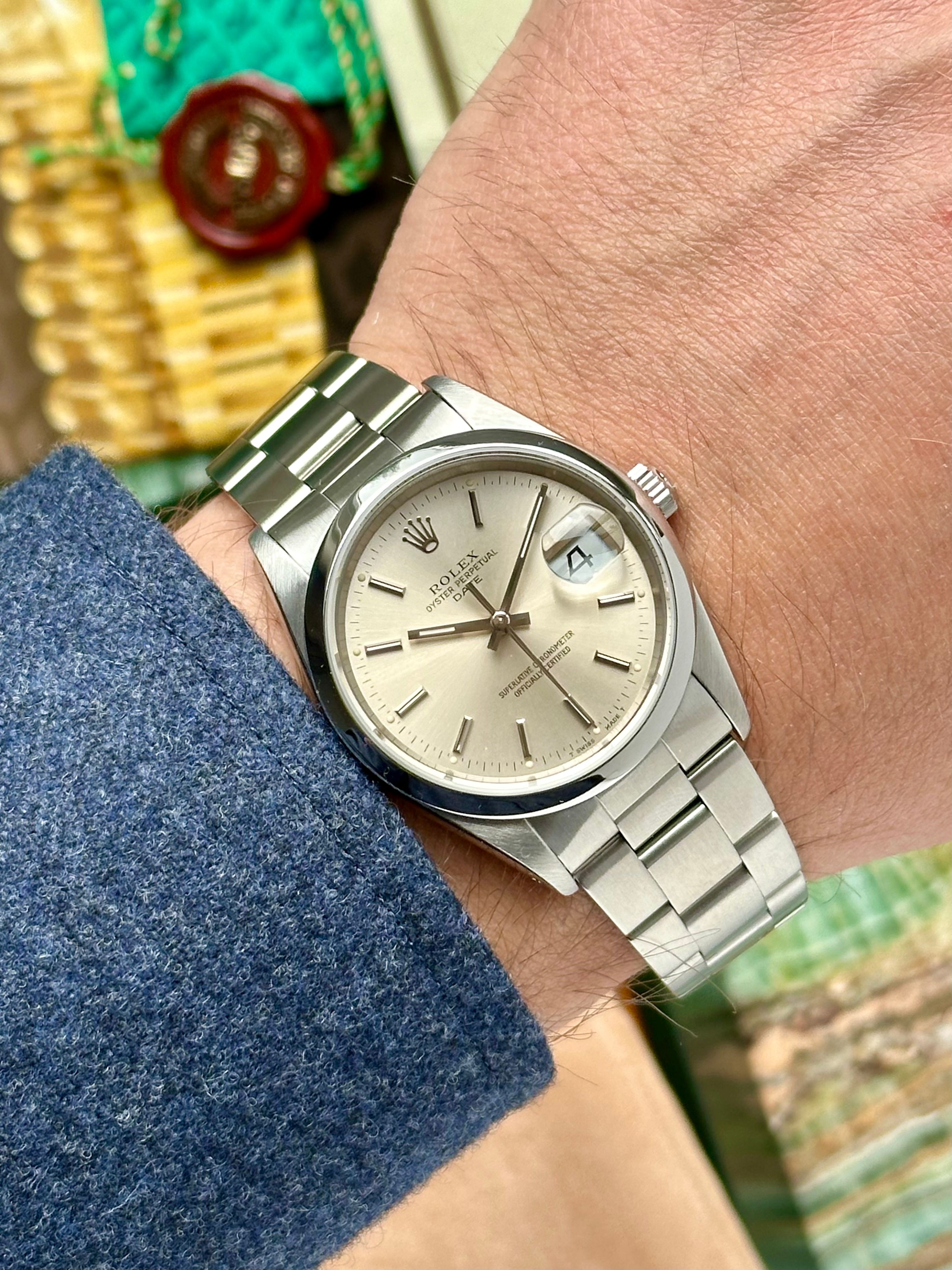 Rolex Oyster Perpetual Date 15200 Silver 1990 with original