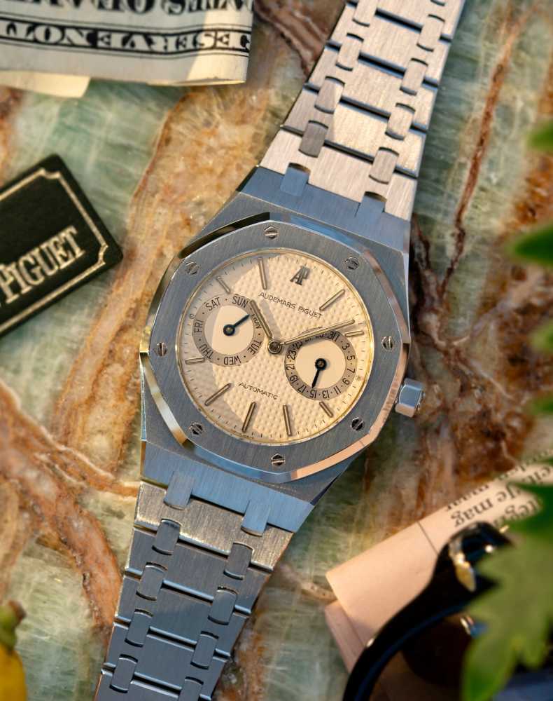 Featured image for Audemars Piguet Royal Oak "Day Date Owl" 25572ST Cream 1993 with original box and papers