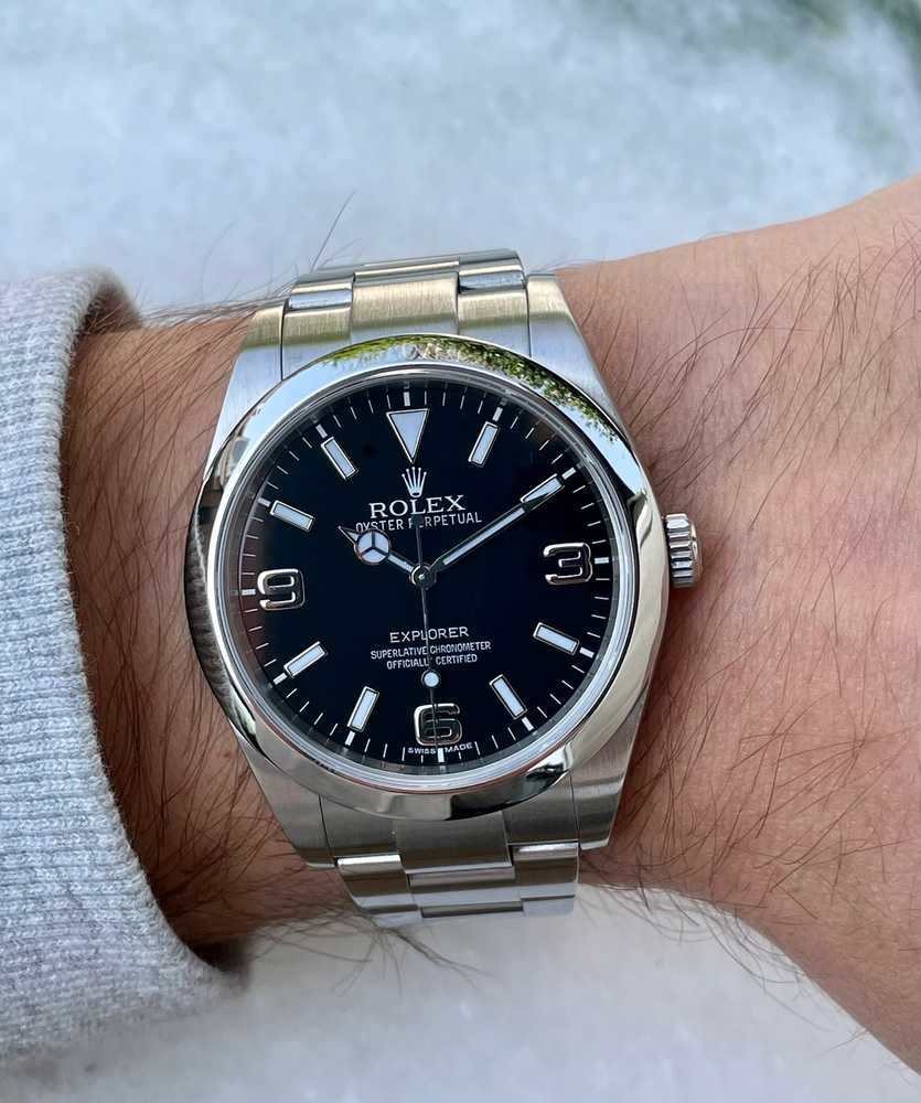 Wrist shot image for Rolex Explorer 214270 Black 2010 with original box and papers