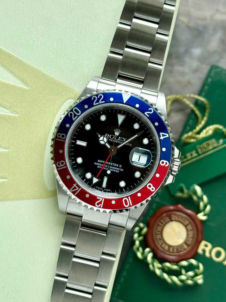 Featured image for Rolex GMT-Master 2 "Pepsi" 16710 T Black 2002 with original box and papers