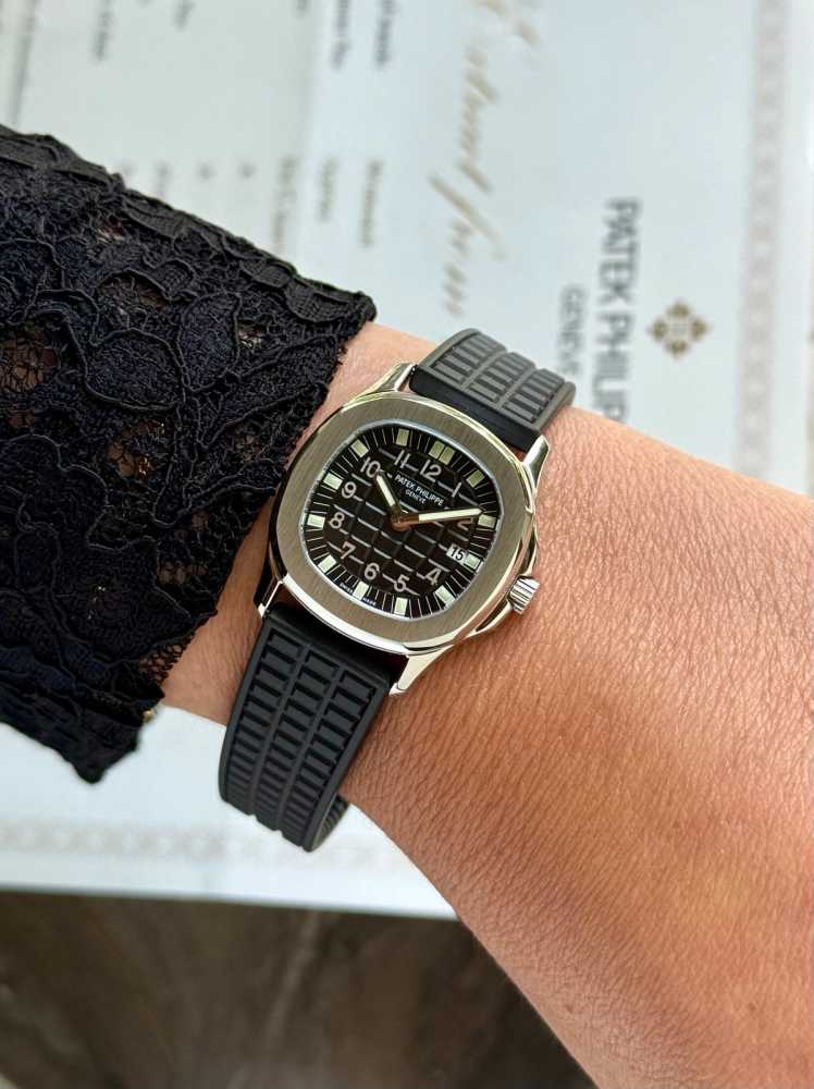 Wrist shot image for Patek Philippe Aquanaut "Patek Service" 4960 Black 1999 with original box and papers