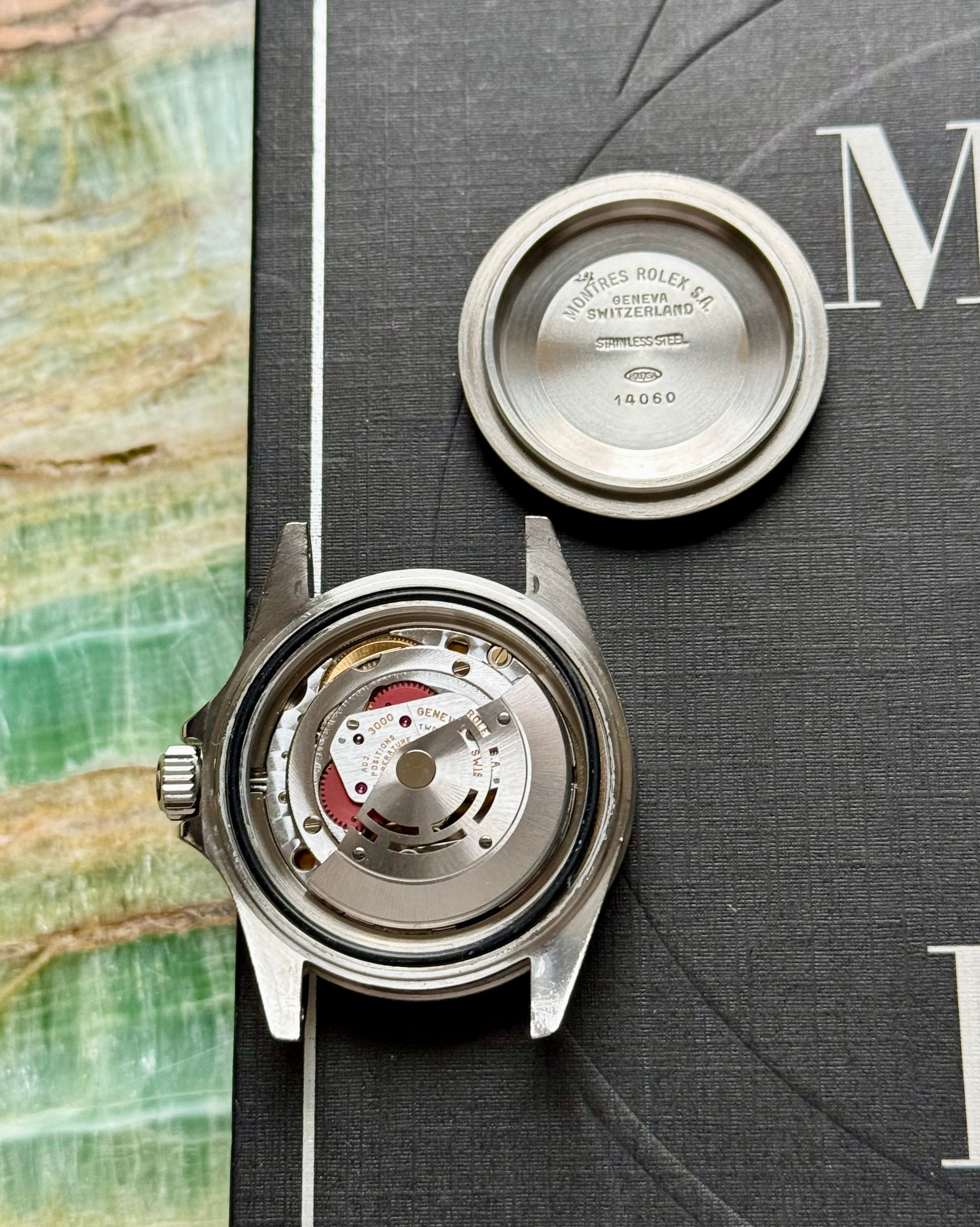 Rolex Submariner 14060 Black 1997 with original box and papers