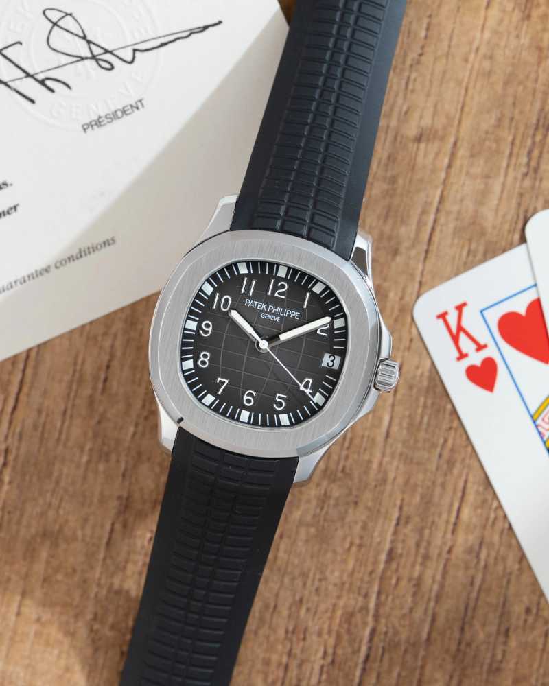 Featured image for Patek Philippe Aquanaut 5165a Grey 2007 with original box and papers