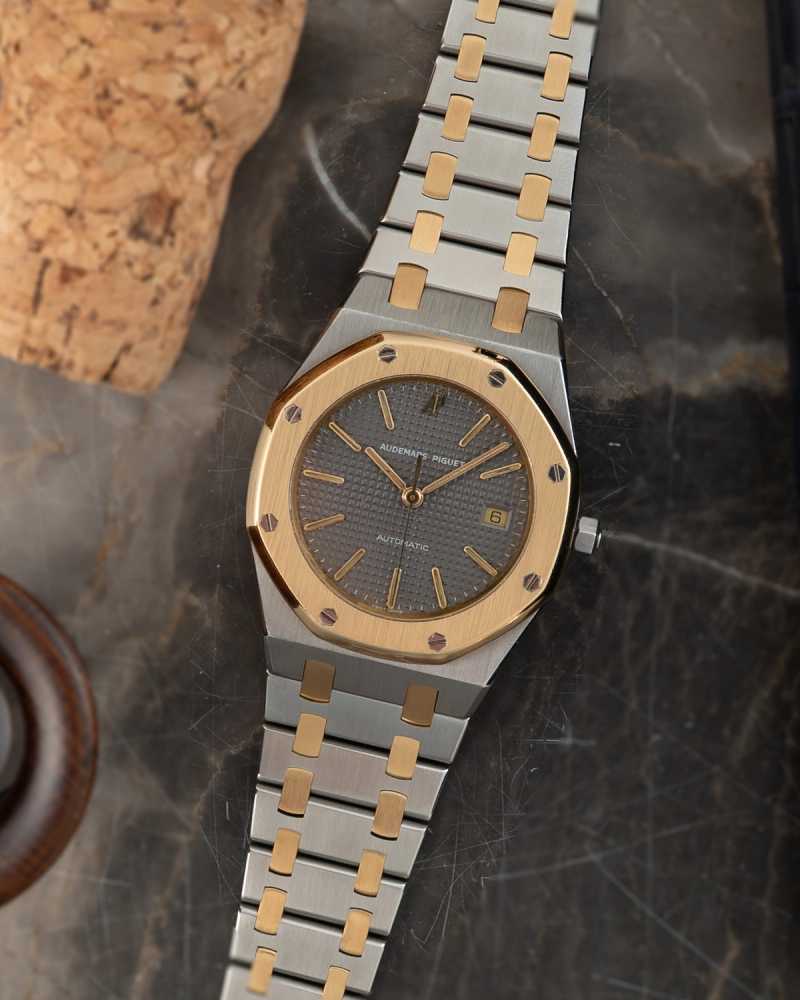 Featured image for Audemars Piguet Royal Oak 14486 SA Grey 1990 with original box and papers