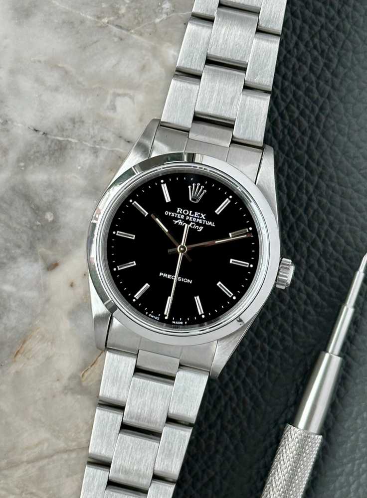 Featured image for Rolex Air-King 14000 Black 1998 with original box and papers