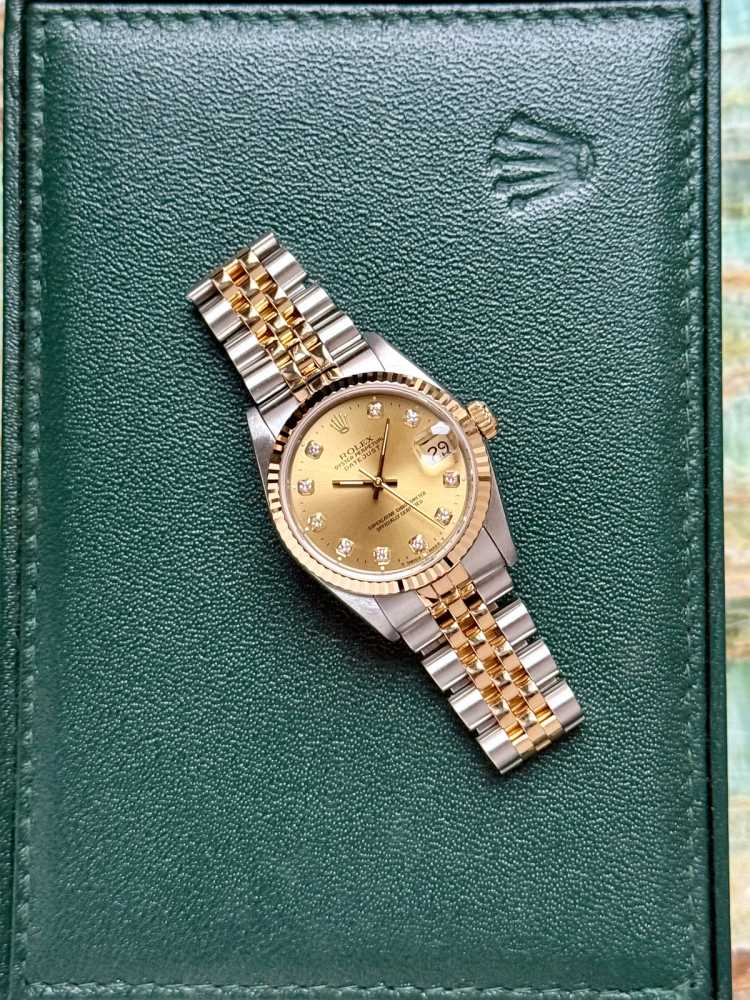 Wrist shot image for Rolex Midsize Datejust 68273 Gold 1995 with original box and papers