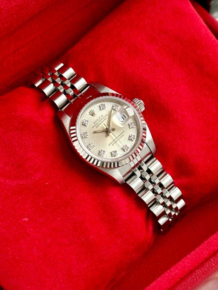 Wrist shot image for Rolex Lady-Datejust "Diamond" 69174G Silver 1991 with original box and papers