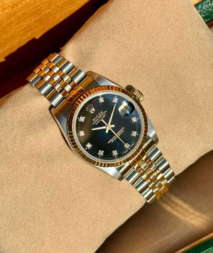 Wrist shot image for Rolex Midsize Datejust "Diamond" 68273G Black 1989 with original box and papers