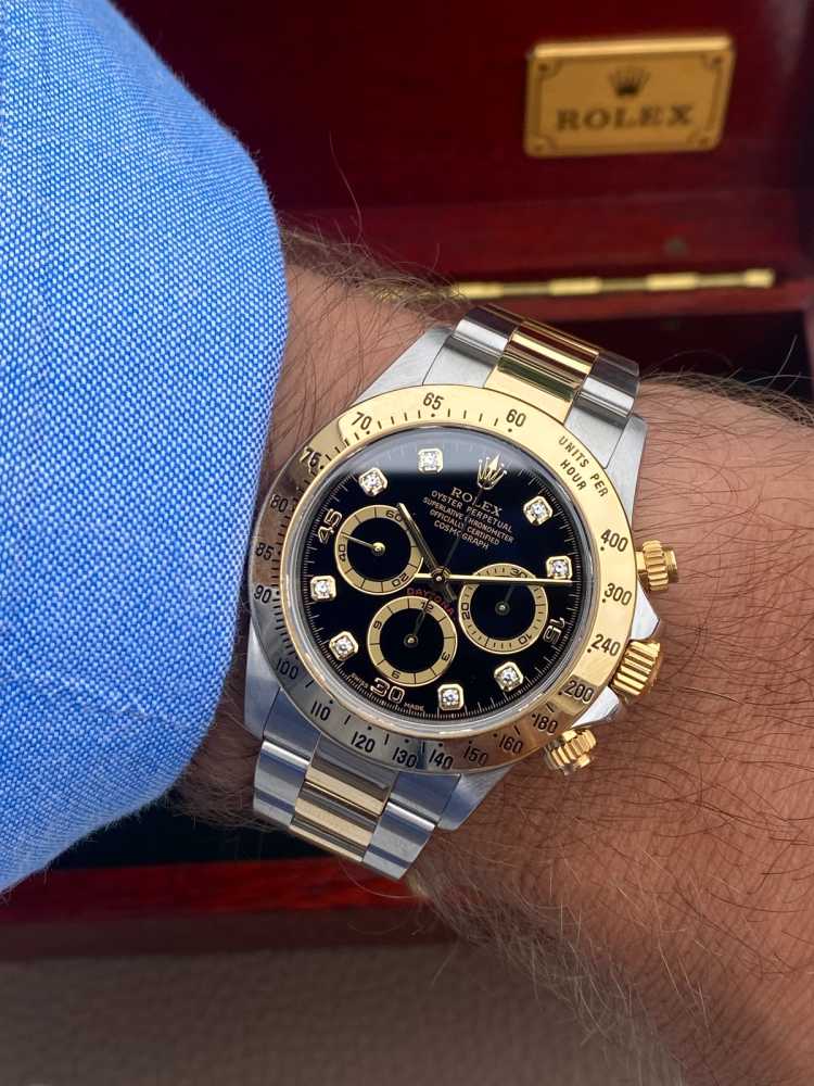 Wrist shot image for Rolex Daytona "A Series" 16523 Black 1999 with original box and papers