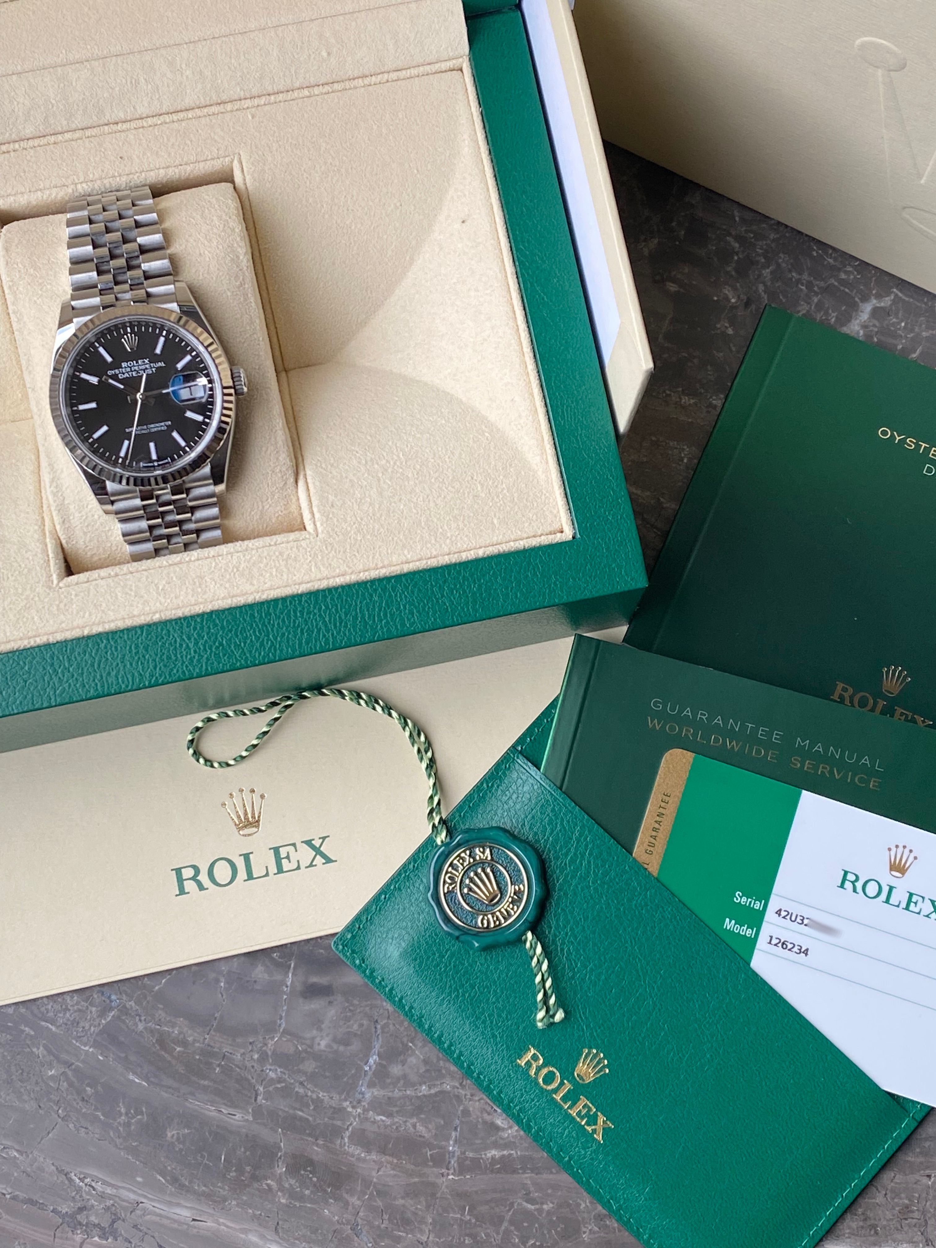 Rolex Datejust 126234 Black 2019 with original box and papers