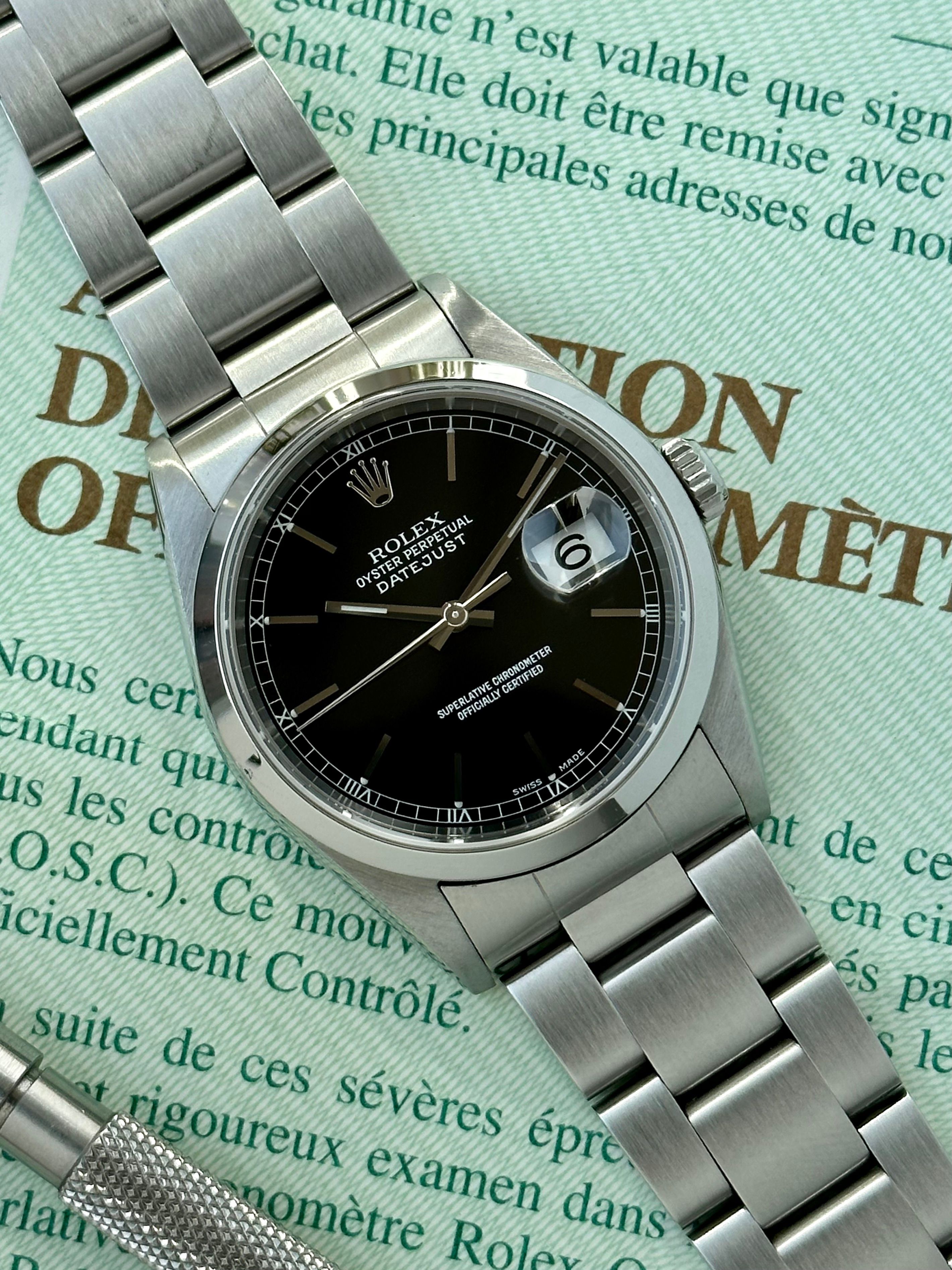 Rolex Datejust 16200 Black 2002 with original box and papers
