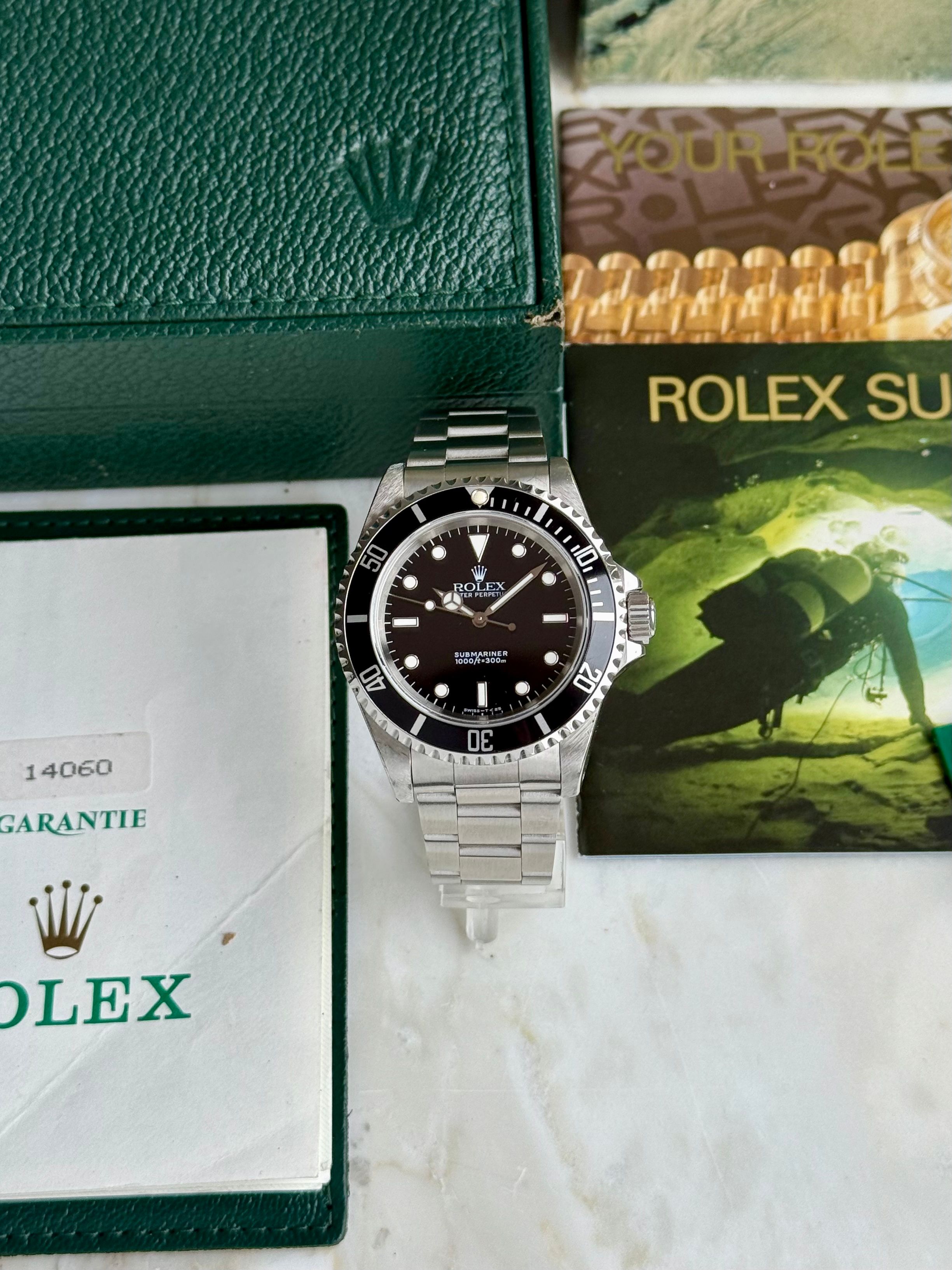 Rolex Submariner 14060 Black 1993 with original box and papers 2