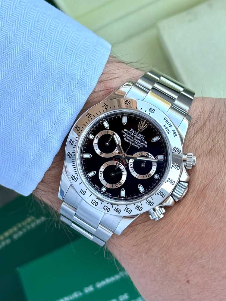 Wrist image for Rolex Daytona 116520 Black 2015 with original box and papers