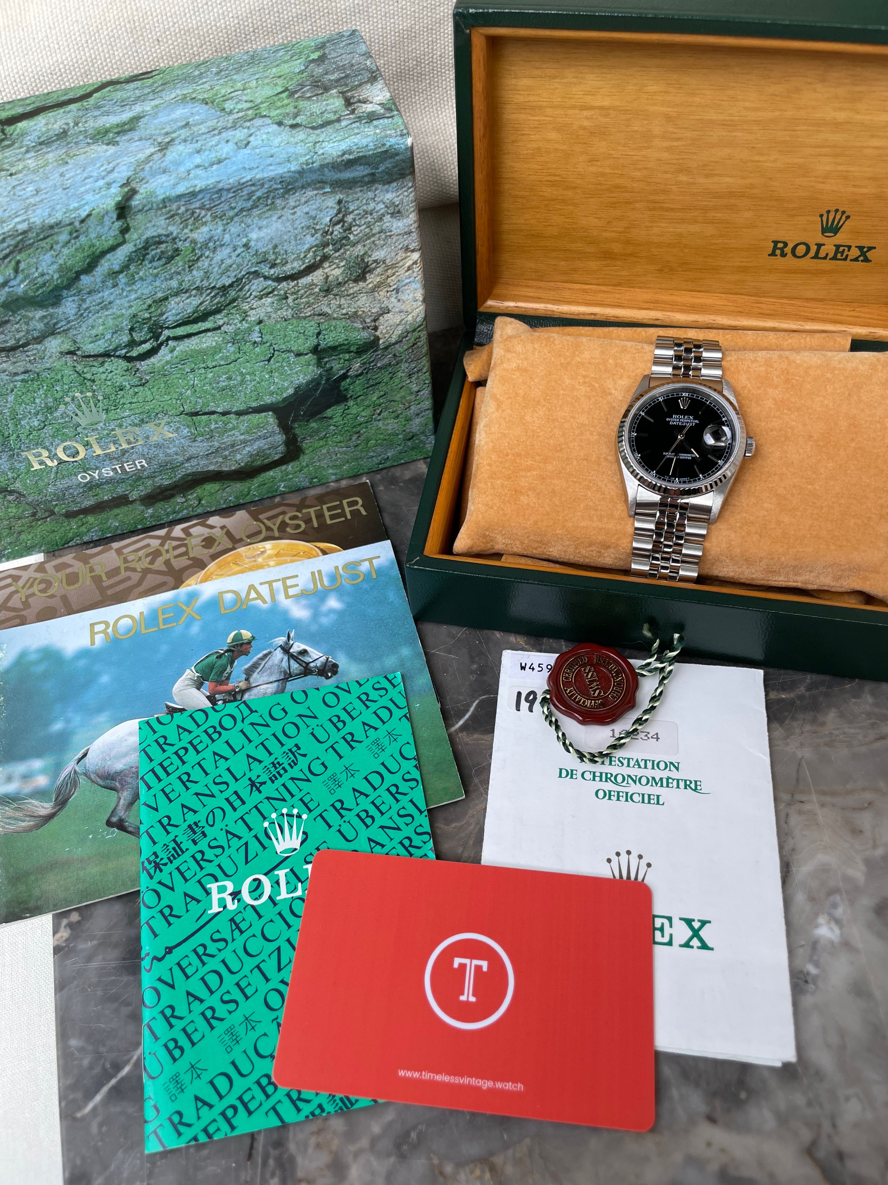 Rolex Datejust 16234 Black 1995 with original box and papers