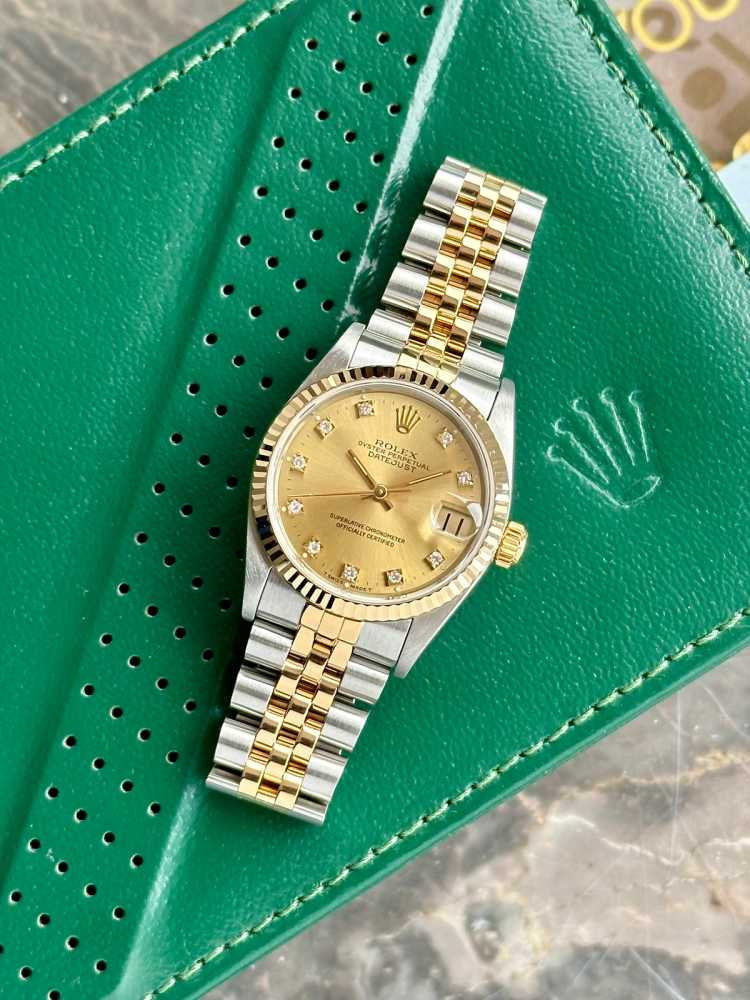 Wrist image for Rolex Midsize Datejust "Diamond" 68273 Gold 1993 with original box and papers