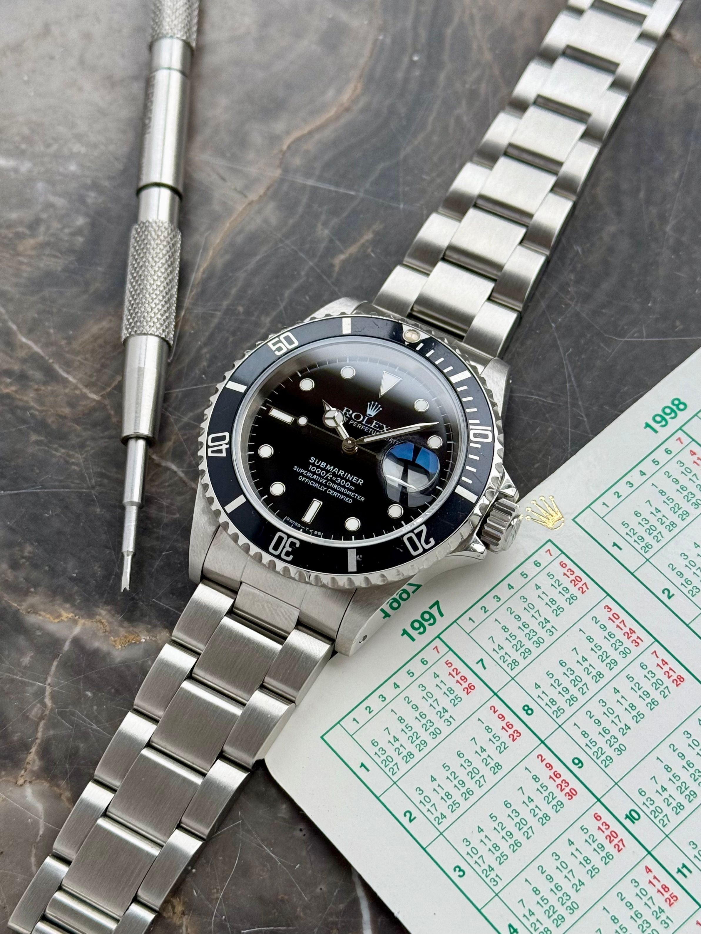 時計 ROLEX Submariner Rolex Submariner 16610 Black 1997 with original box and papers
