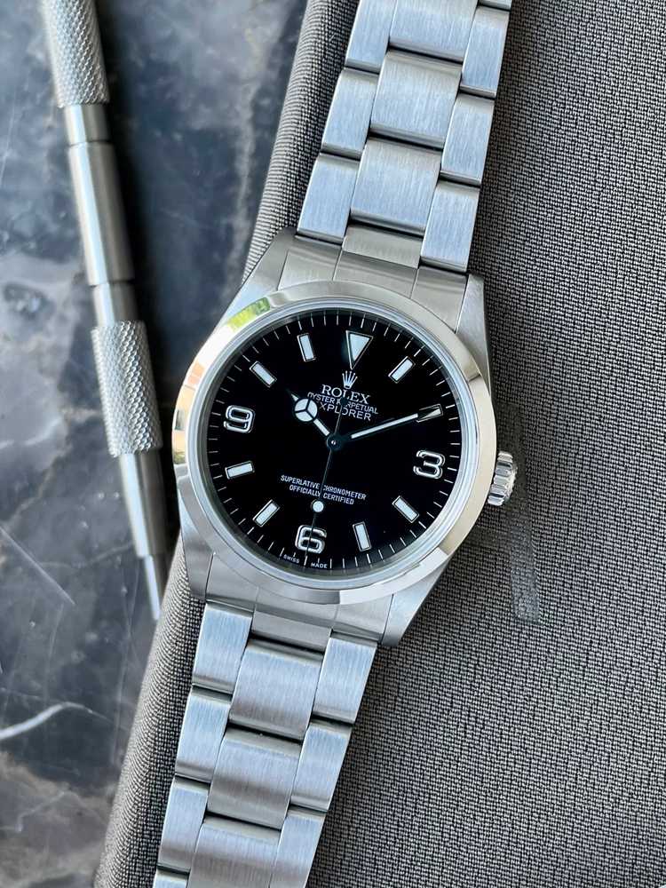 Current image for Rolex Explorer 14270 Black 1999 with original box and papers 2