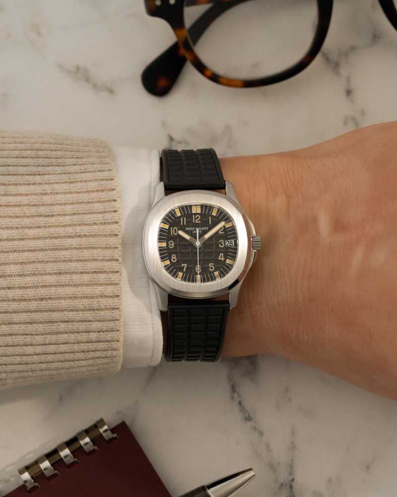 Wrist shot image for Patek Philippe Aquanaut 5066 Black 1999 with original box and papers