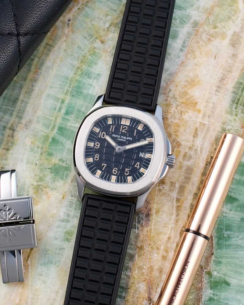 Featured image for Patek Philippe Aquanaut "Patek Service" 4960 Black 1997 with original box and papers