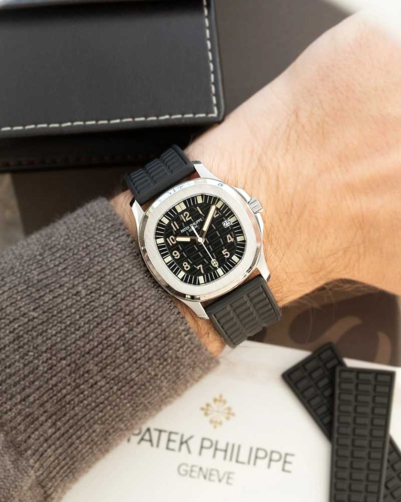 Wrist shot image for Patek Philippe Aquanaut "Patek Service" 5064 Black 2007 with original box and papers