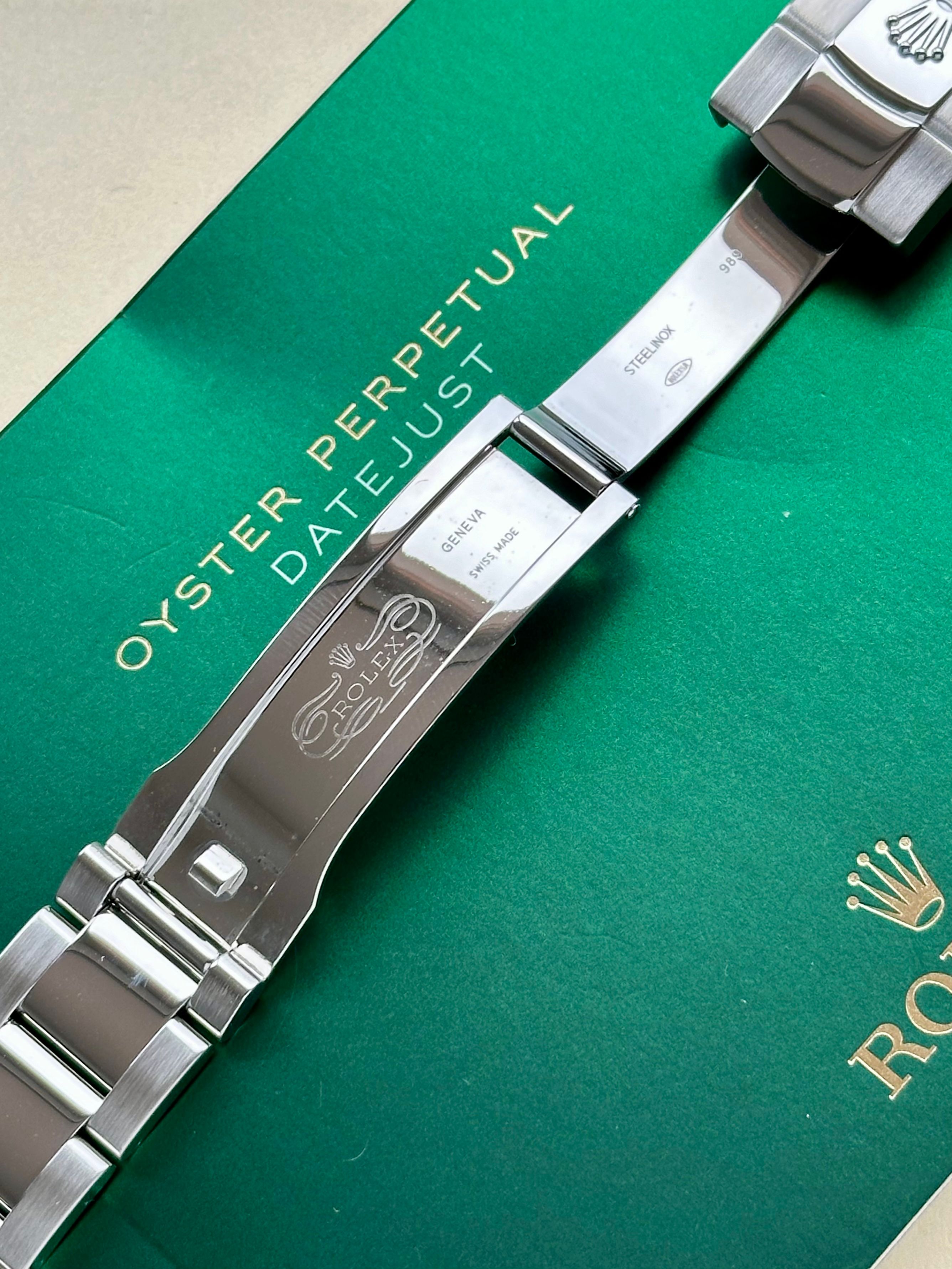 Rolex Datejust 126300 Black 2020 with original box and papers