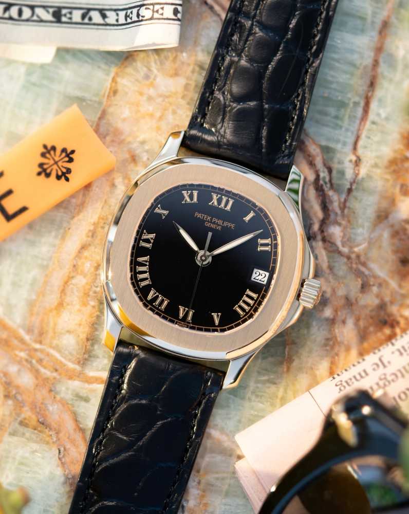 Featured image for Patek Philippe Aquanaut PATEK SERVICE 5060J Black 1997 with original box and papers