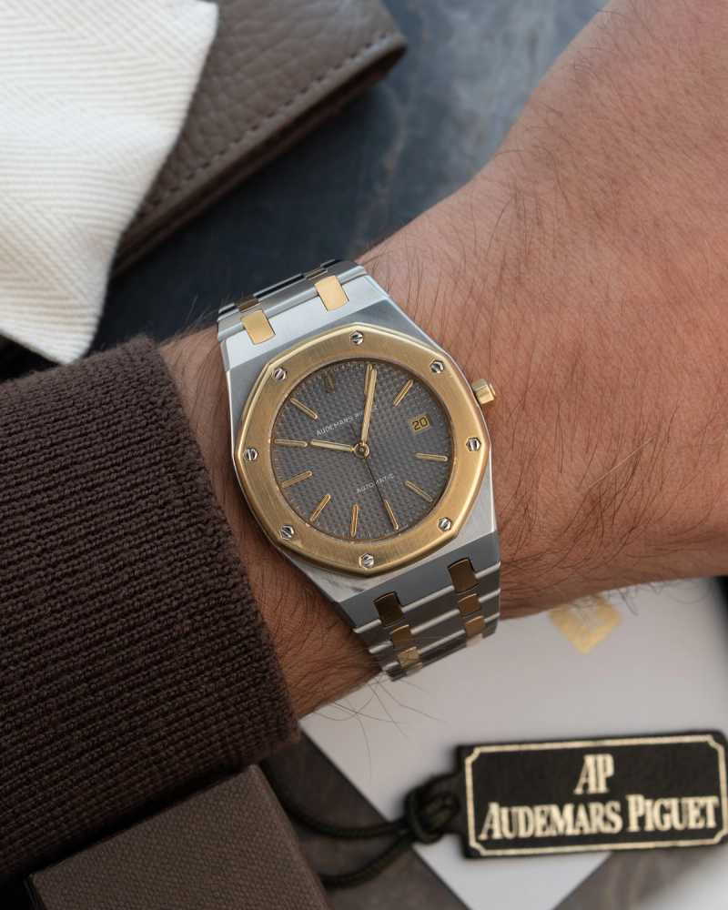 Wrist shot image for Audemars Piguet Royal Oak 14486 SA Grey 1990 with original box and papers 2