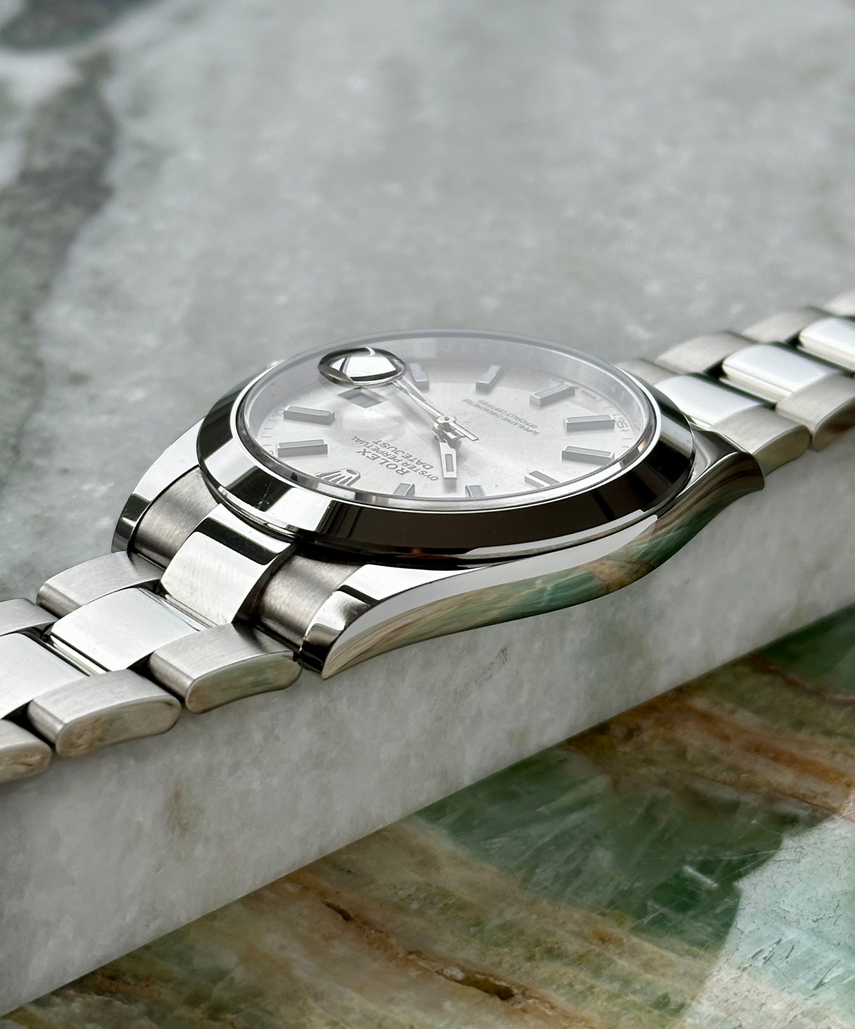 Rolex Datejust 126300 Silver 2021 with original box and papers