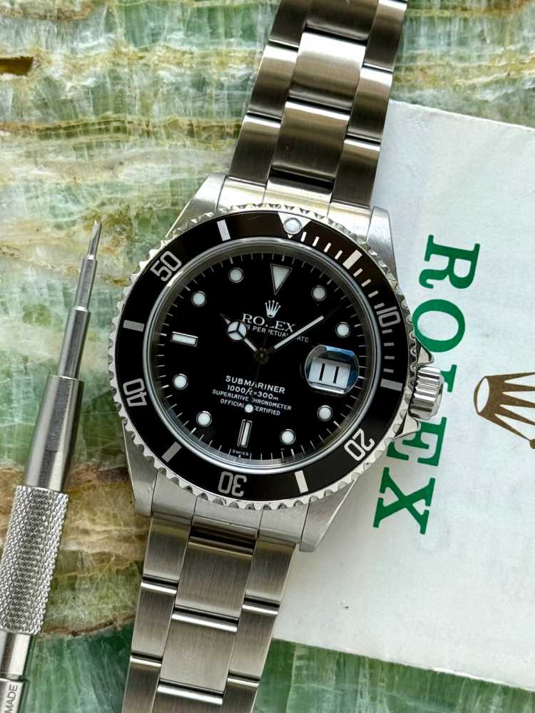 Featured image for Rolex Submariner 16610 Black 1999 with original box and papers 3