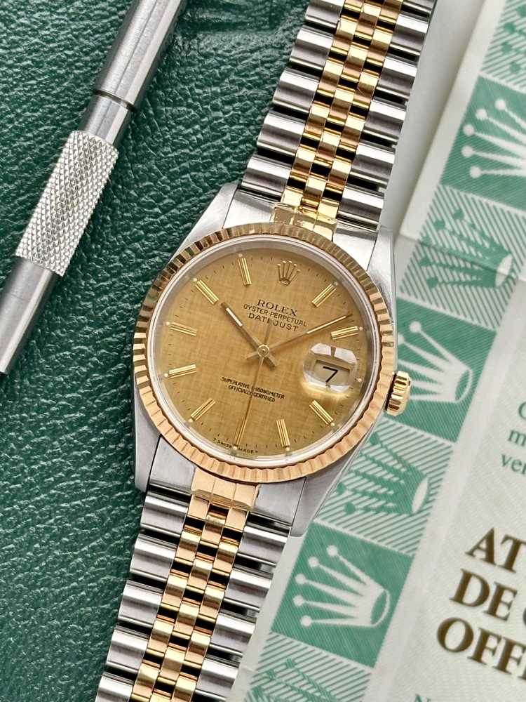 Featured image for Rolex Datejust "Linen" 16233 Gold 1993 with original box and papers