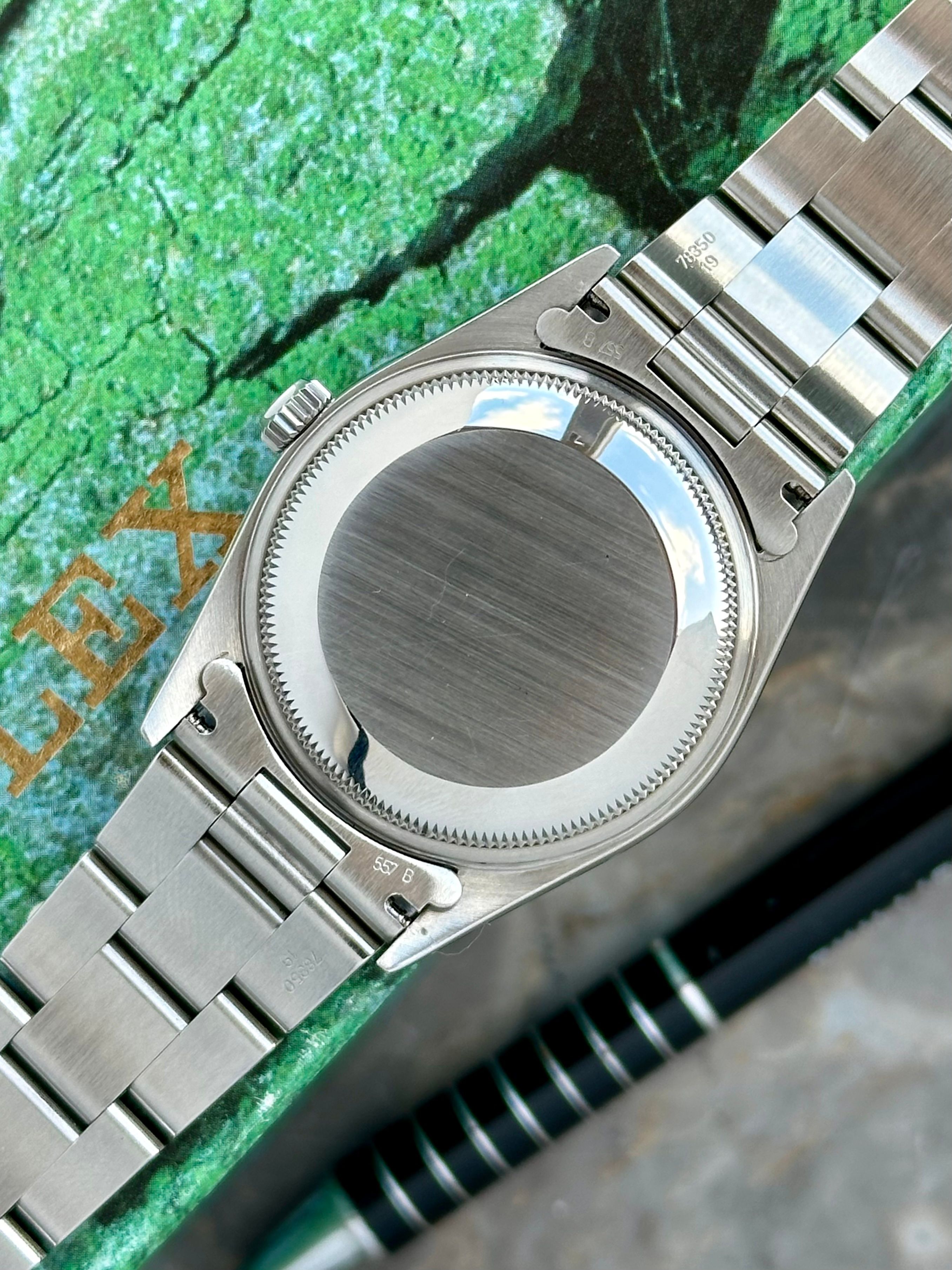 Rolex Oyster Perpetual Date 15200 Black 1995 with original box and