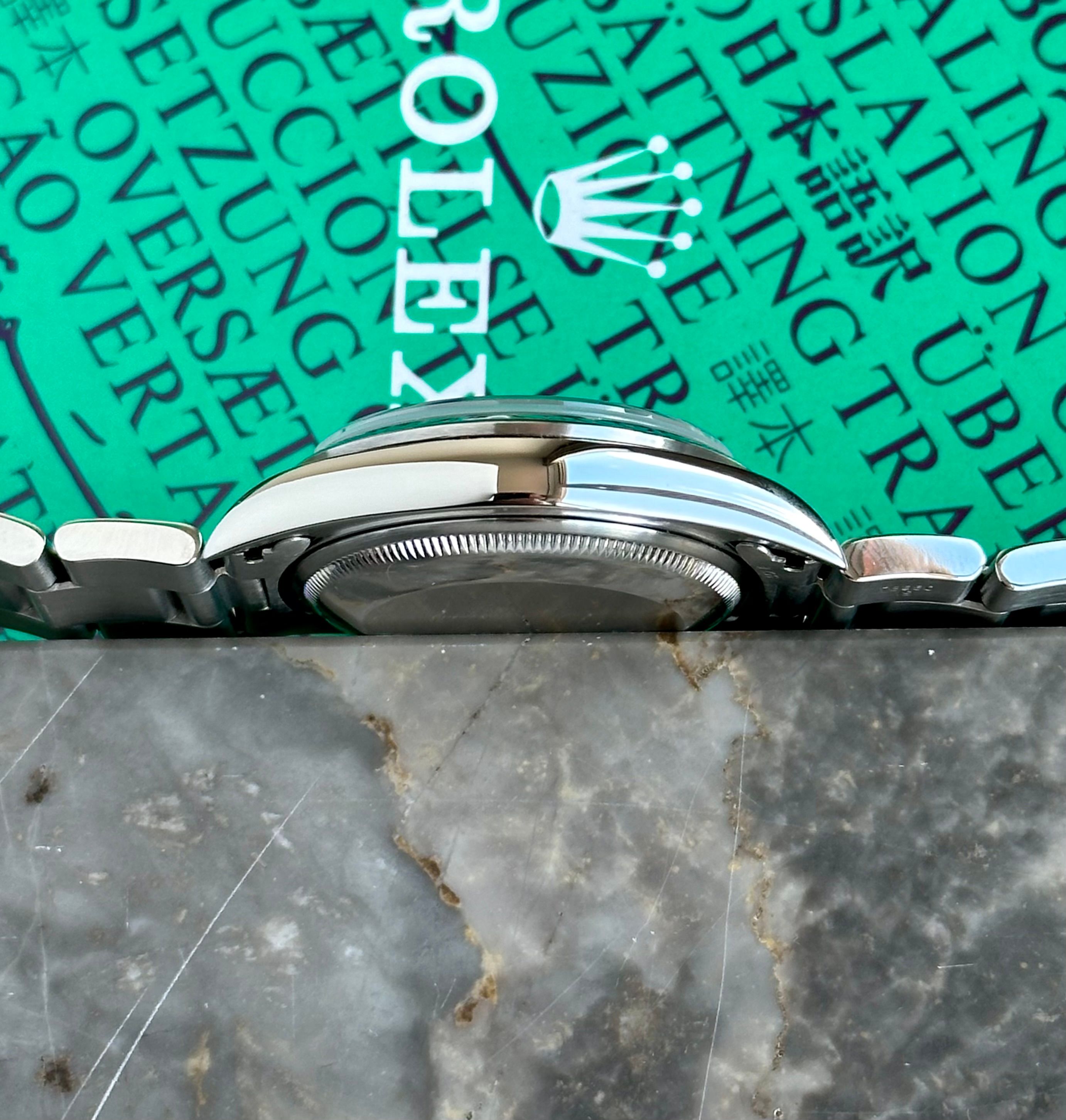 Rolex Oyster Perpetual Date 15200 Black 1995 with original
