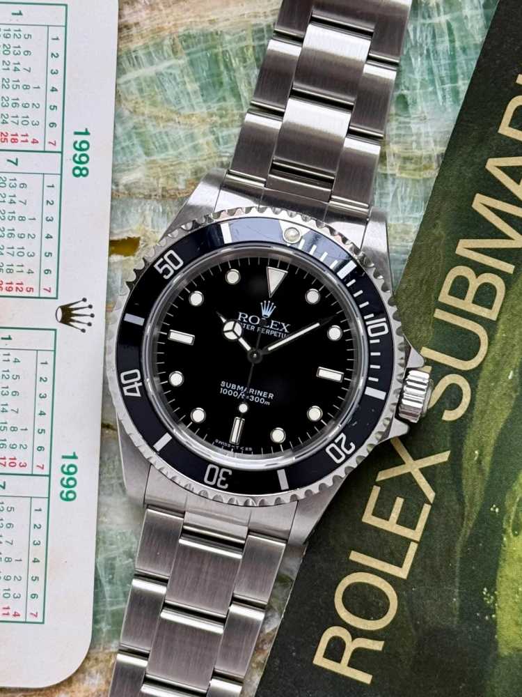 Featured image for Rolex Submariner 14060 Black 1997 with original box and papers