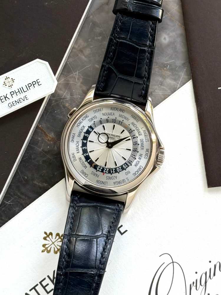 Featured image for Patek Philippe World Timer 5130 G Silver 2011 with original box and papers