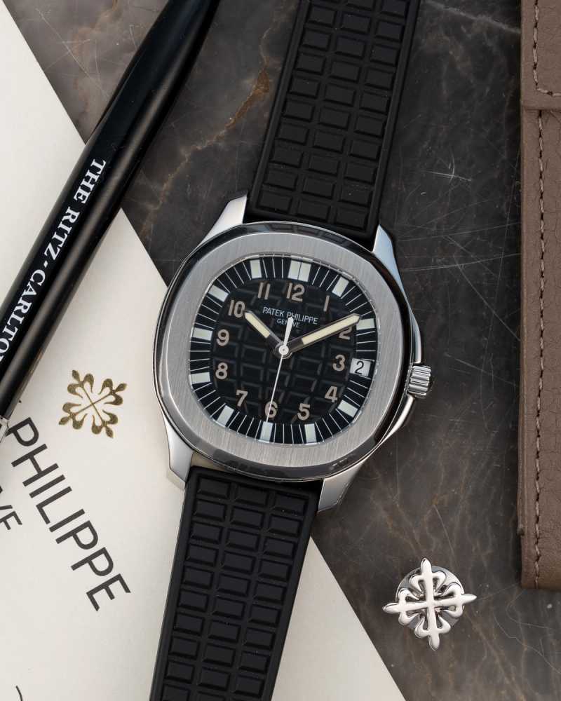 Featured image for Patek Philippe Aquanaut "Patek Service" 5065 Black 2006 with original box and papers