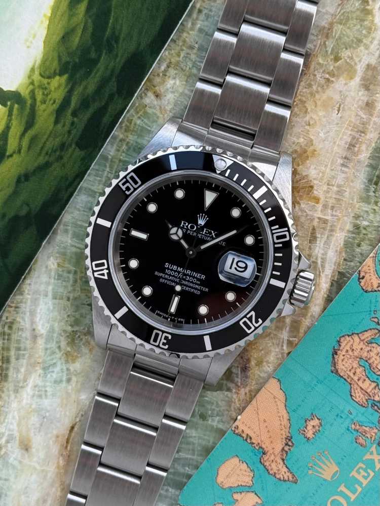 Featured image for Rolex Submariner 16610 Black 1995 with original box and papers