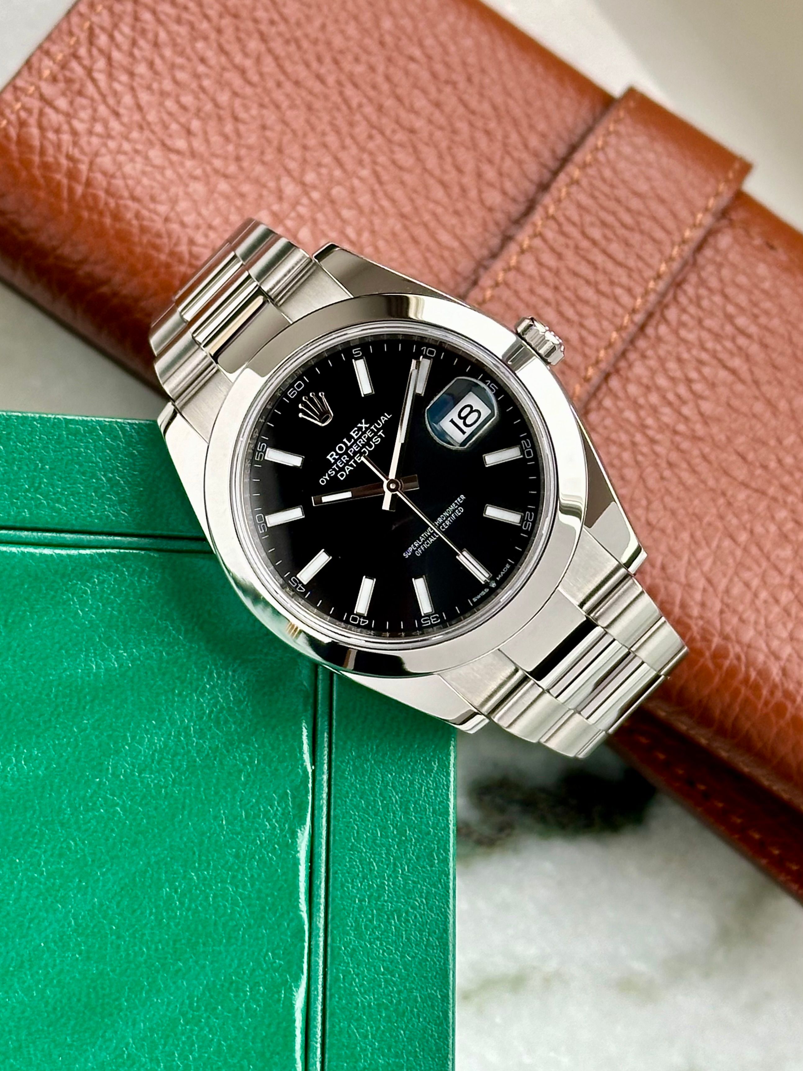 Rolex Datejust 126300 Black 2020 with original box and papers