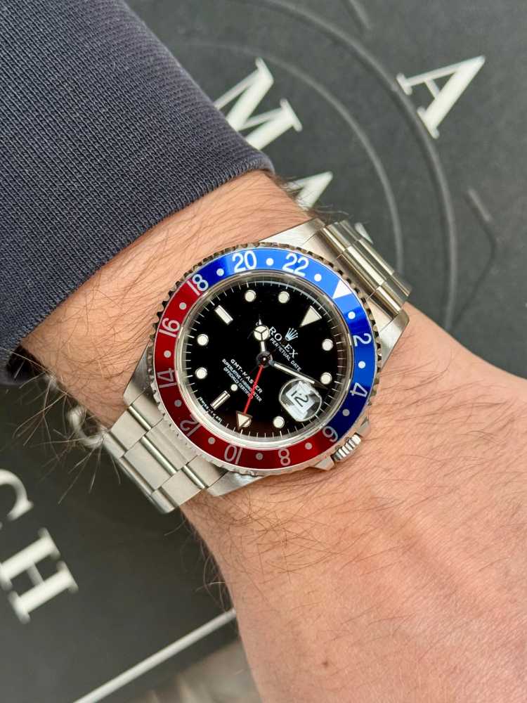 Wrist shot image for Rolex GMT-Master "Pepsi" 16700 Black 1996 with original box and papers