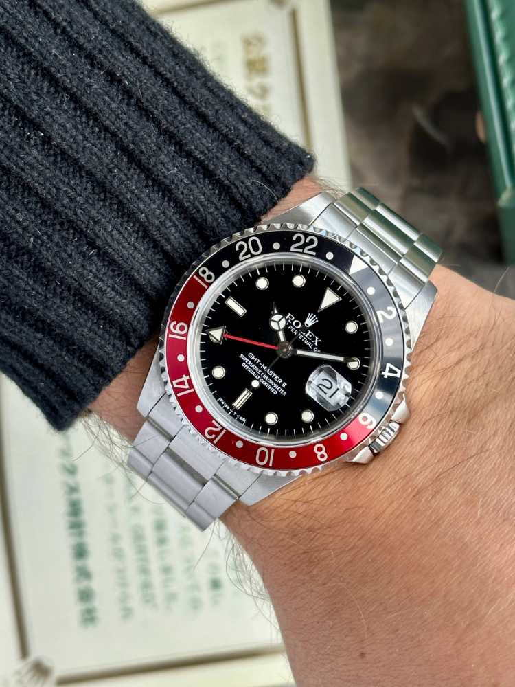 Wrist image for Rolex GMT-Master II "Coke" 16710 Black 1989 with original box and papers