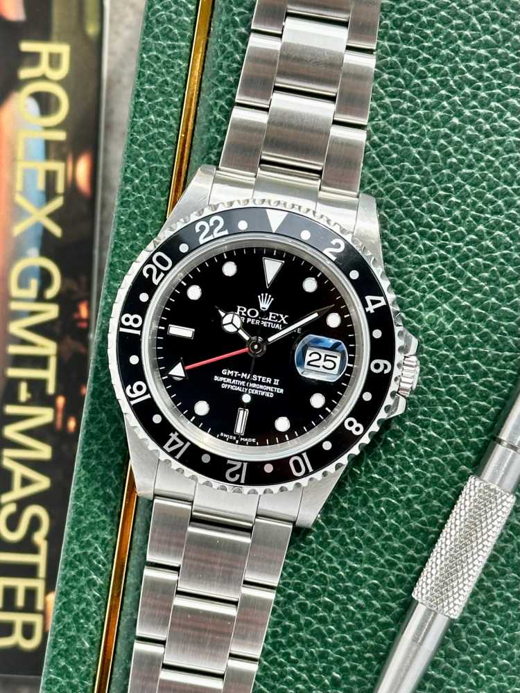 Current image for Rolex GMT-Master II 16710 Black 2001 with original box and papers