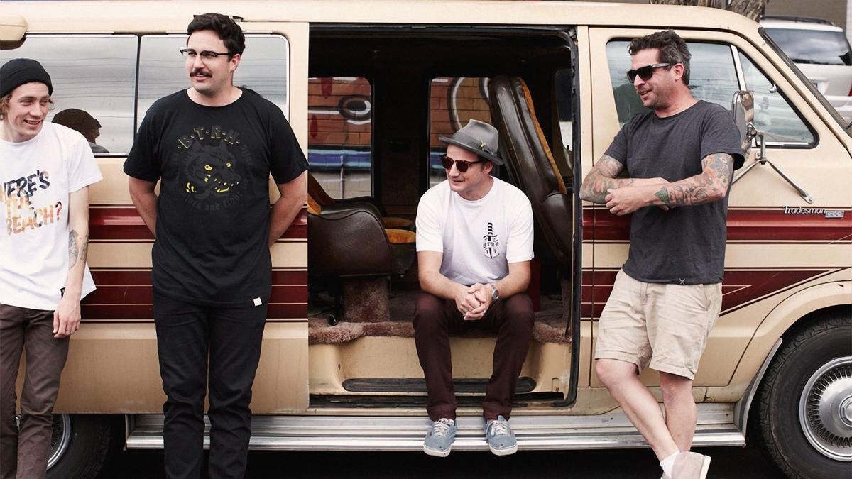 A group of Mo Bros hanging out before they hop in their retro van to start conversations about men's health